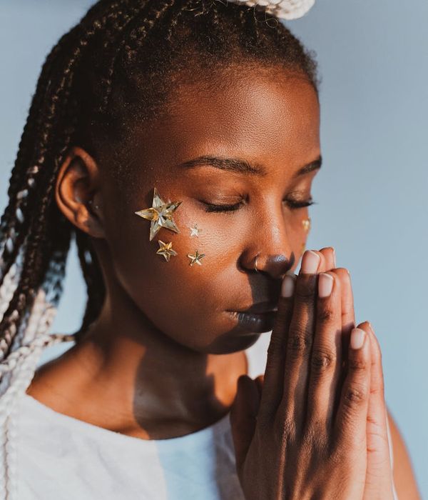 Peaceful person meditating, embodying inner calm and clarity.